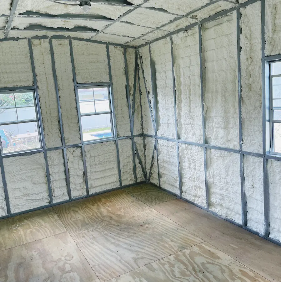 Closed-cell spray foam insulation applied to wall cavities in a residential project in Medway