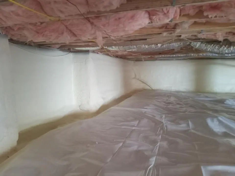 Crawl space encapsulation with closed-cell spray foam for Commercial Roof Restoration in Medway